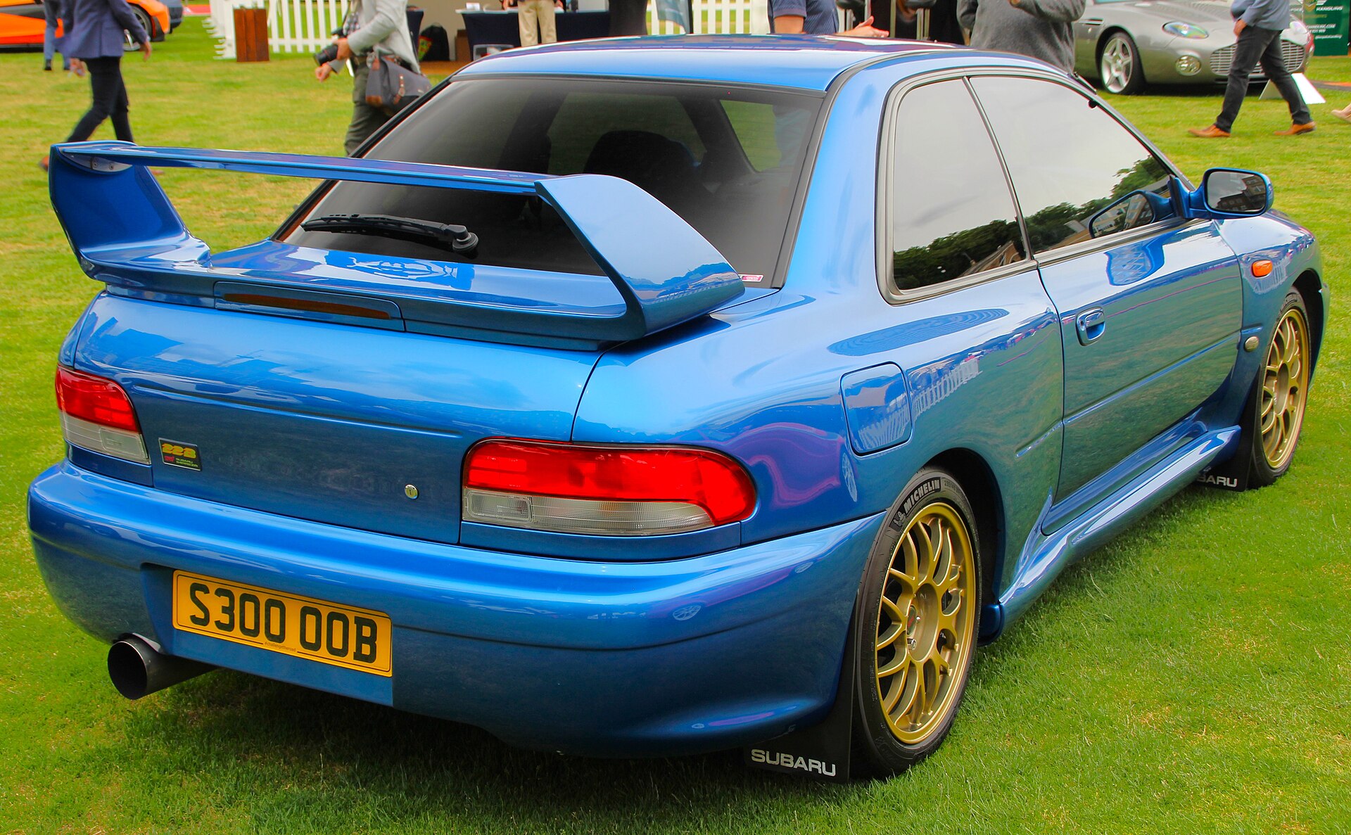 Rear view of a blue 1998 Subaru Impreza 22B STi with its rear wing