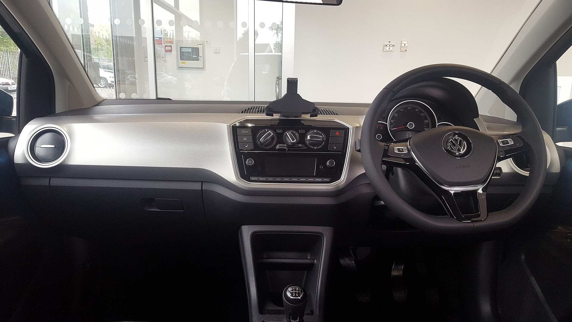 Interior and dashboard of a facelifted Volkswagen up!