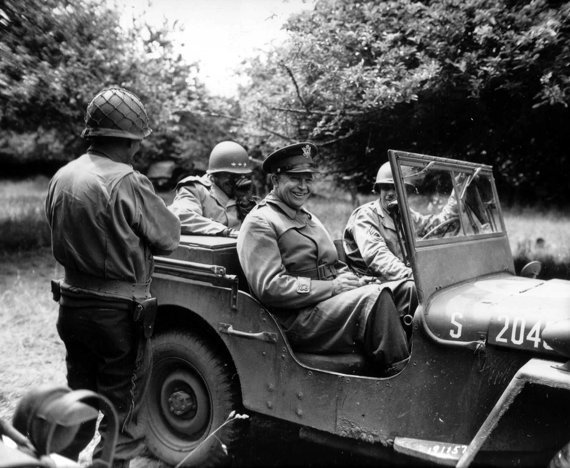 General Eisenhower seated in a Jeep